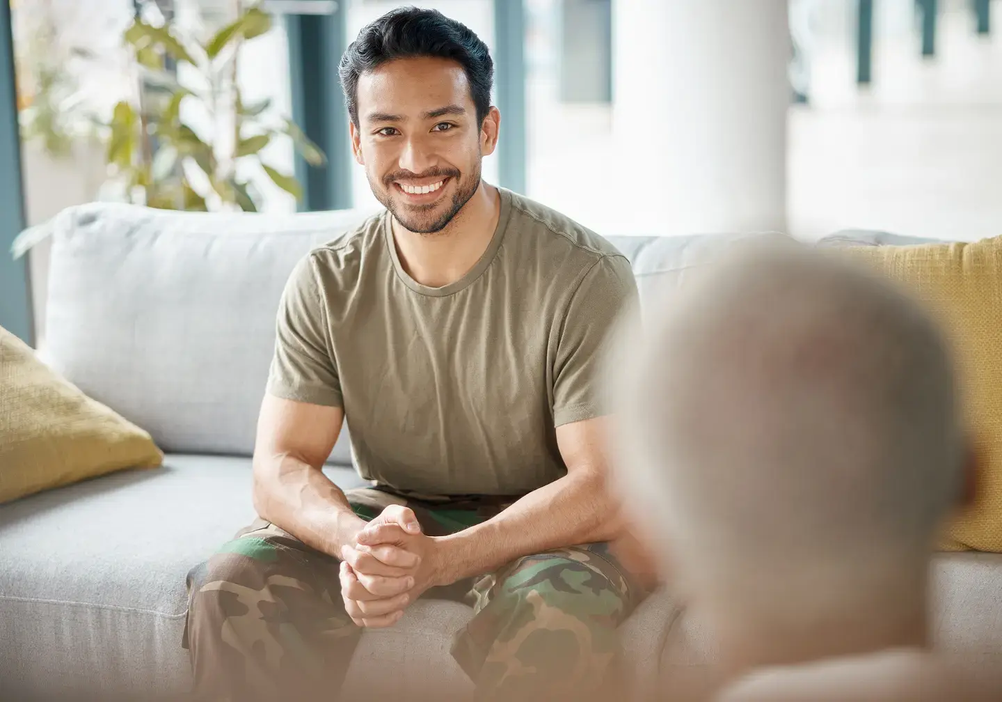 Veteran sitting on couch
